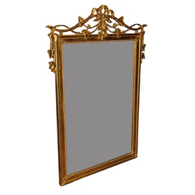 A Decorative Arts giltwood mirror