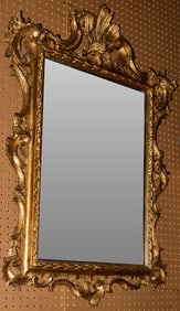 A Rococo style giltwood mirror