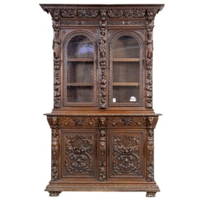 A large French oak Renaissance style buffet deux corps circa 1850