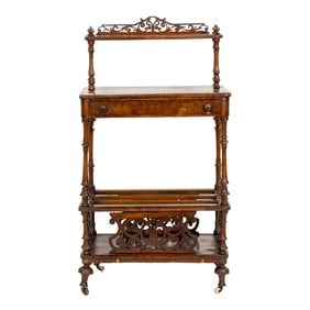 A diminutive Victorian burled walnut and tooled leather desk third quarter 19th century
