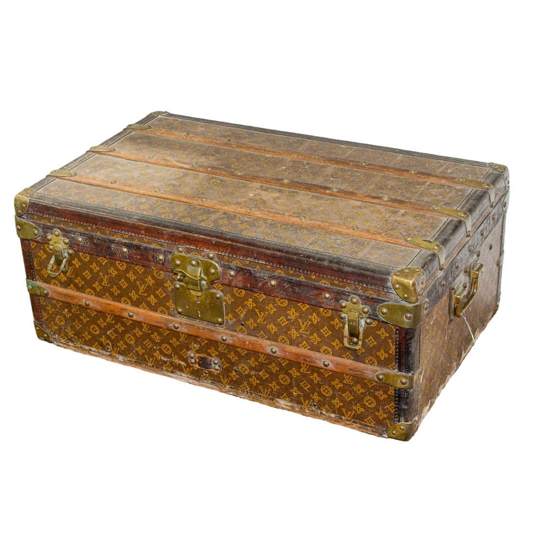 A Louis Vuitton monogram steamer trunk, first quarter 20th century, interior with retailer label for (1 of 6)