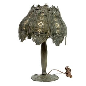 An American Loevsky & Loevsky patinated metal and slag glass shade on lily pad standard