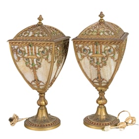 A pair of American polychrome and gilt metal and slag glass newel post lamps