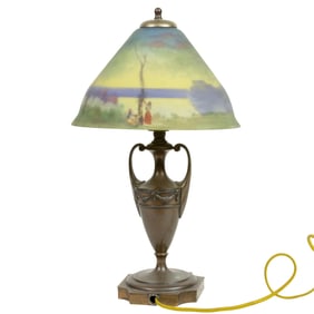 A Pairpoint reverse decorated table lamp