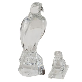A Baccarat glass model of a Falcon and a Sphinx paperweight