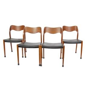 A set of four Danish Modern J.L. Moller Model 71 teak dining chairs with leather seats