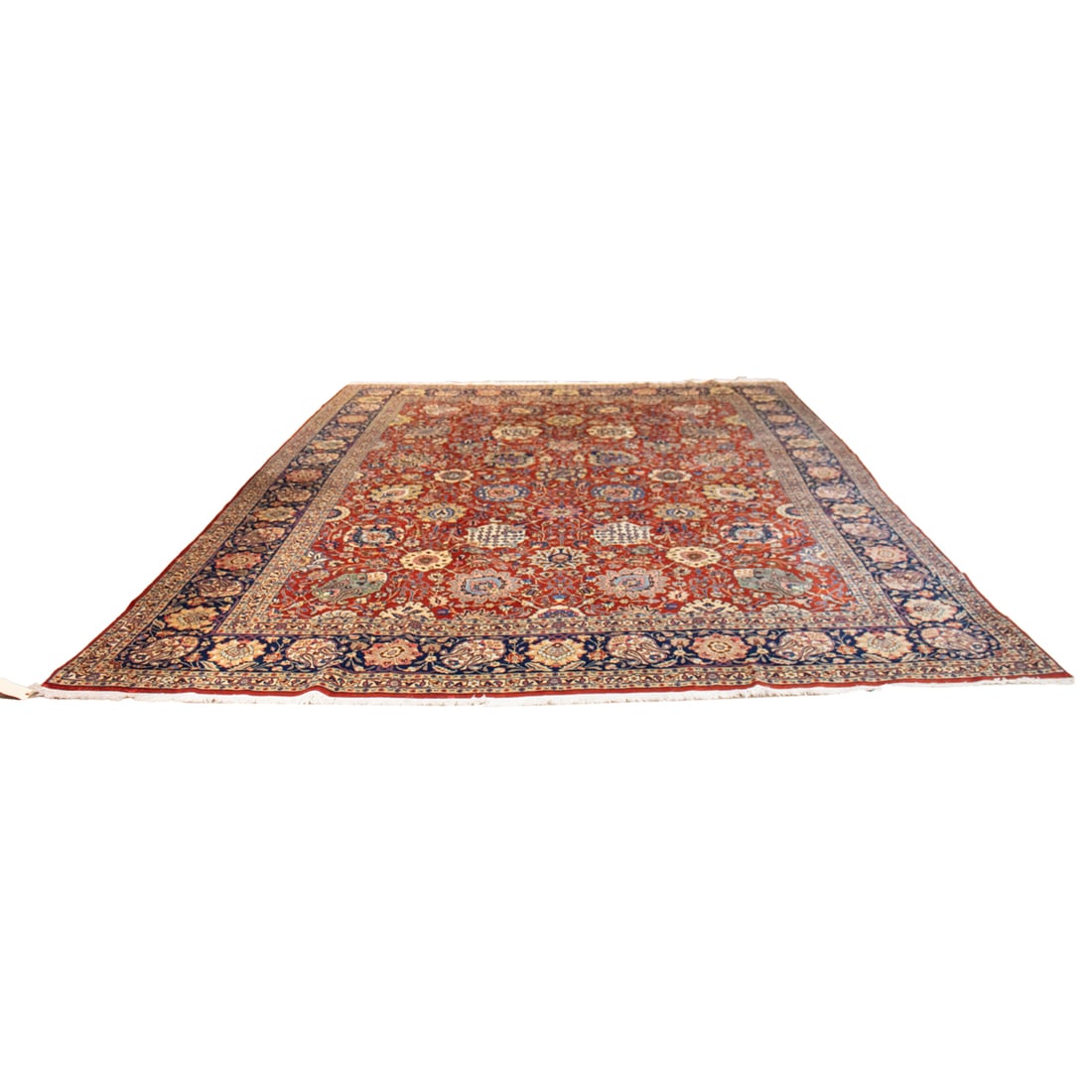 A Persian Kashan carpet: A Persian Kashan carpet, 10'11" x 14'11"