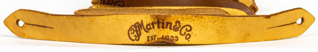 A group of approximately fifteen leather guitar strap connectors: A group of approximately fifteen leather guitar strap connectors. This property is being sold at public auction as provided by Internal Revenue Code section 6335. Only the right, title, and interest o