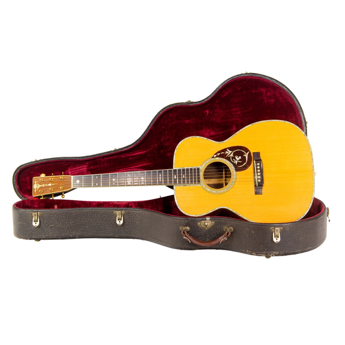 A Martin & Co Custom guitar: A Martin & Co Custom guitar, marked Custom with serial number 439676, includes hard case. This property is being sold at public auction as provided by Internal Revenue Code section 6335. Only the righ