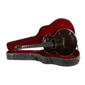 An Orville Gibson acoustic guitar c. 1898
