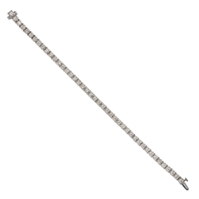 A diamond and 14k white gold tennis bracelet