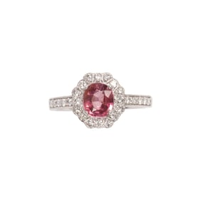 A garnet, diamond, and platinum ring
