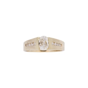 A diamond and 14k gold ring
