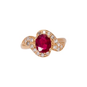 A ruby, diamond, and 14k gold ring