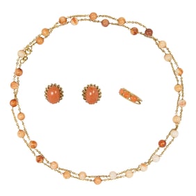 A group of coral and gold jewelry