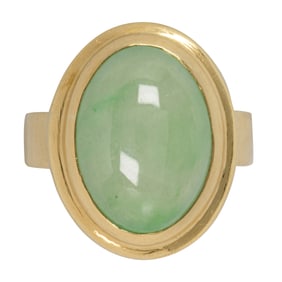 A honey jade and 18k gold ring