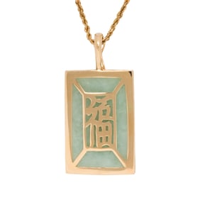 A jade and 14k gold pendant-enhancer and chain