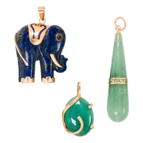 Two jade and one lapis lazuli and 14k gold pendants