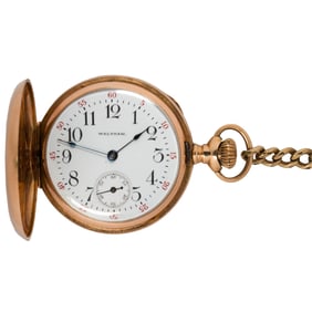A diamond and 14k gold Waltham pocket watch and chain