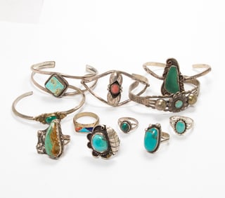 Eleven turquoise and sterling silver cuffs and rings