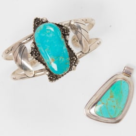 A turquoise and sterling silver cuff and pendant
