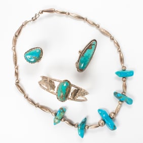 A group of sterling silver and turquoise jewelry