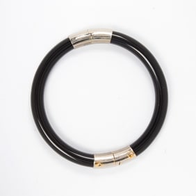 An onyx and silver bangle