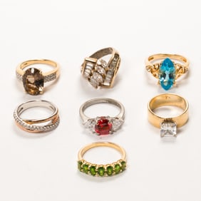 A group of gemstone and silver rings
