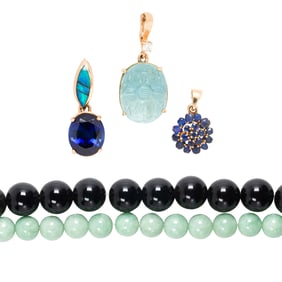 A group of gemstone and gold jewelry
