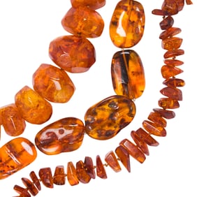Three amber bead necklaces