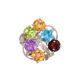 A gemstone and 14k white gold ring