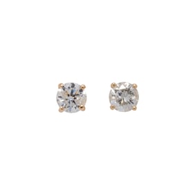 A pair of diamond and 14k gold stud earrings