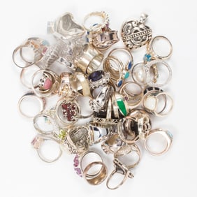 A group of sterling silver and hardstone rings