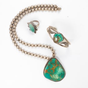 A group of turquoise and sterling silver jewelry