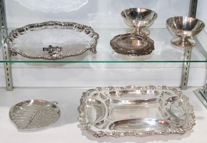 Fourteen silverplated table articles comprising various trays and bowls