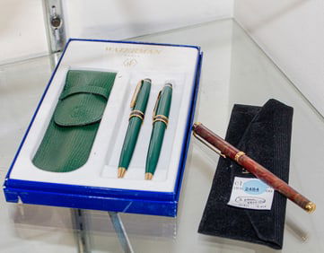 A Watermen Expert rollerball pen and pencil set in green and a Hanae Mori pen