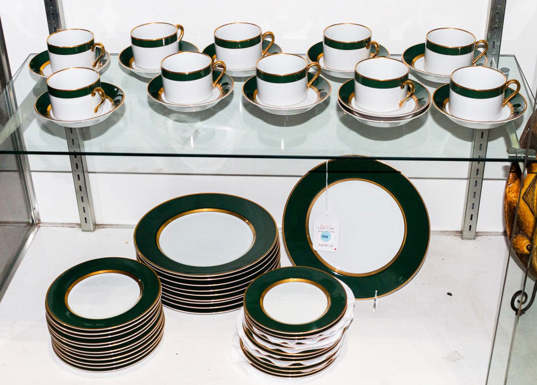 A Fitz & Floyd porcelain dinner service in the Renaissance Dark Green pattern: A Fitz & Floyd porcelain dinner service in the Renaissance Dark Green pattern, comprising (10) dinner plates, 10.25"dia; (11) salad plates, 7.5"dia; (12) bread plates, 6.5"dia; (10) coffee cups, 2"h;