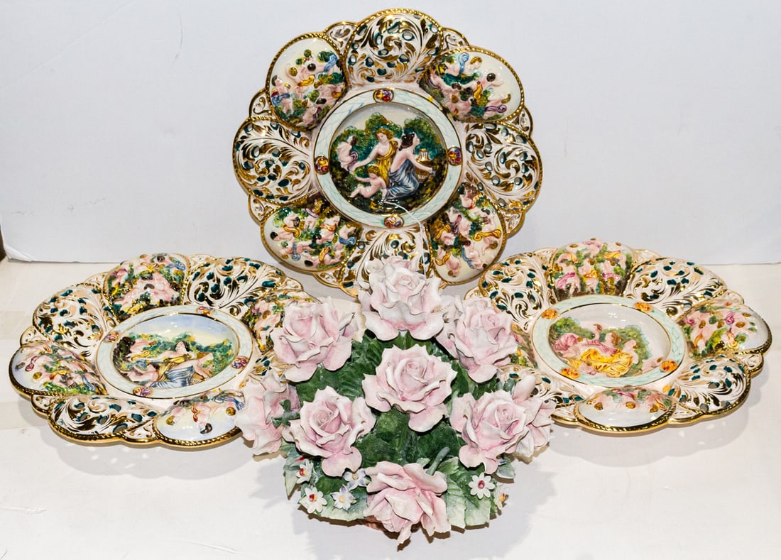 Three Capodimonte style ceramic reticulated footed platters: Three Capodimonte style ceramic reticulated footed platters, signed in gilt 'Capodimonte Italy', 14"dia and a porcelain flower basket, unmarked, 10.5"h [4 total]