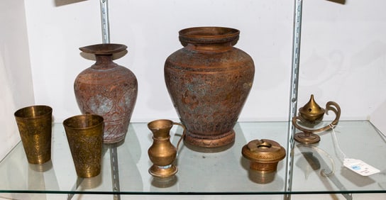 A group of ten copper and brass table aricles