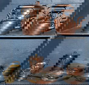 A collection of copper cookware