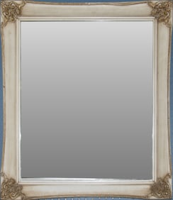 A white painted retangular wall mirror