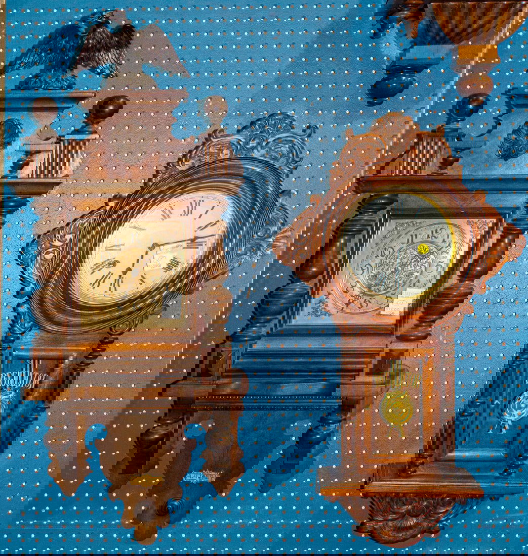 Two German wall clocks: Two German wall clocks, the first with eagle final, the second a regulator clock, 29"h and 35"h