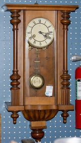 A Vienna regulator clock and another