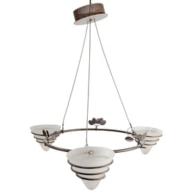 A contemporary patinated metal three light chandelier
