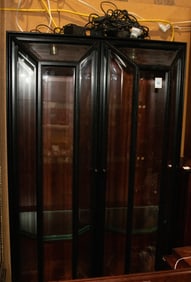 A large Roche Bobois rosewood veneer bookcase and work station