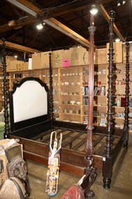 A Julia Gray New York four poster bed in the Regency taste
