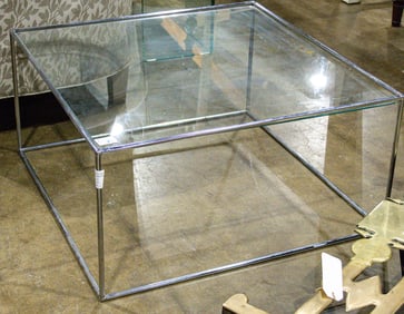 A Modernist chromed metal and glass top square side table