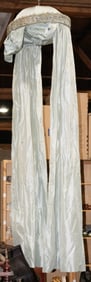 A French bed canopy in celadon silk and silvered hardware