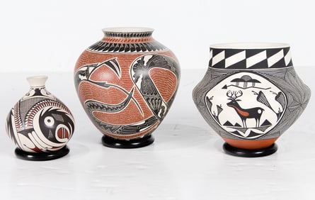 A group of Acoma and San Ildefonso pottery