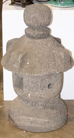 A Japanese stone garden lantern